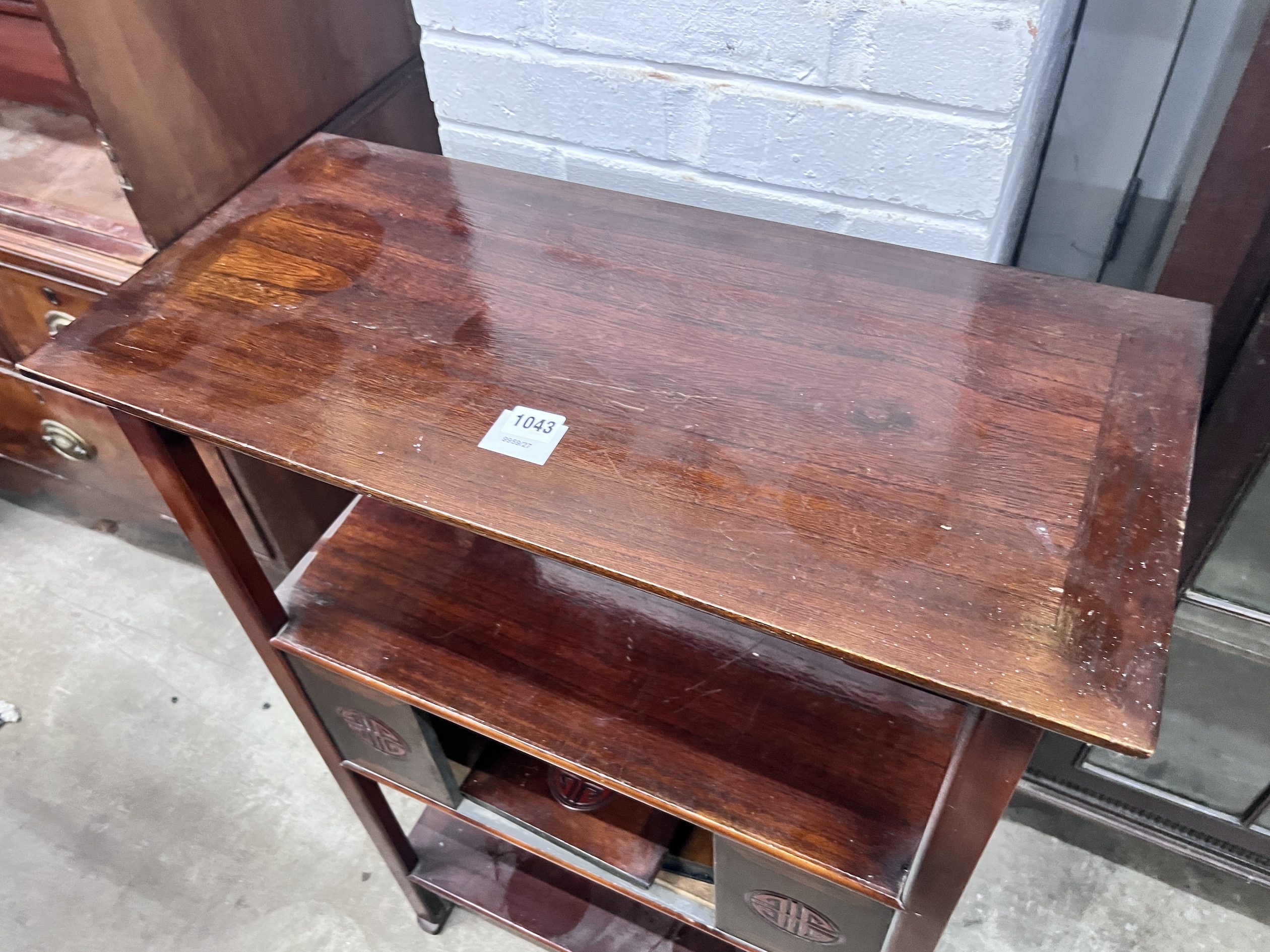 A Japanese hardwood three tier etagere, width 66cm, depth 31cm, height 98cm